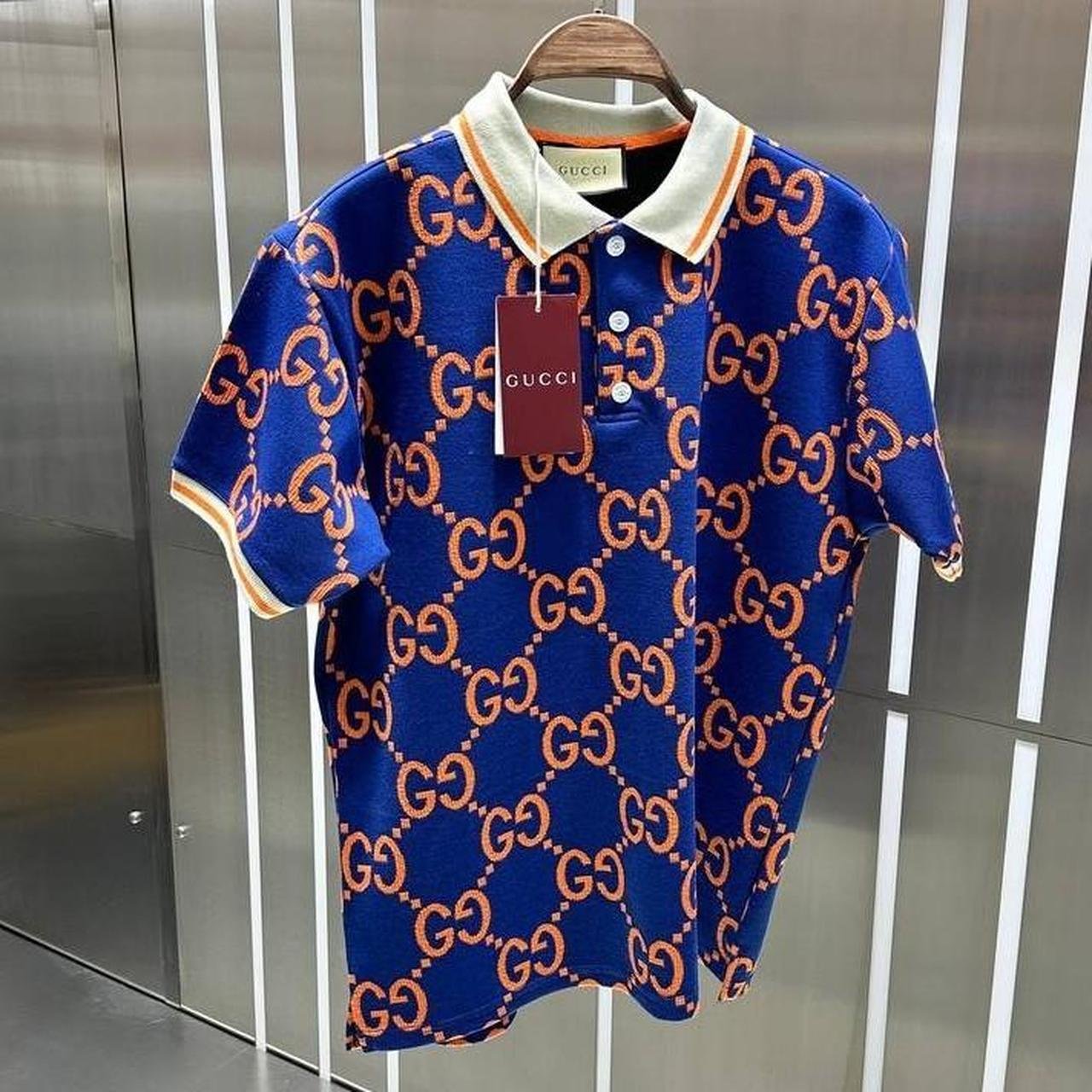 P0-1-24.jpg Gucci Men's Orange and Blue Polo-shirts - Image 1
