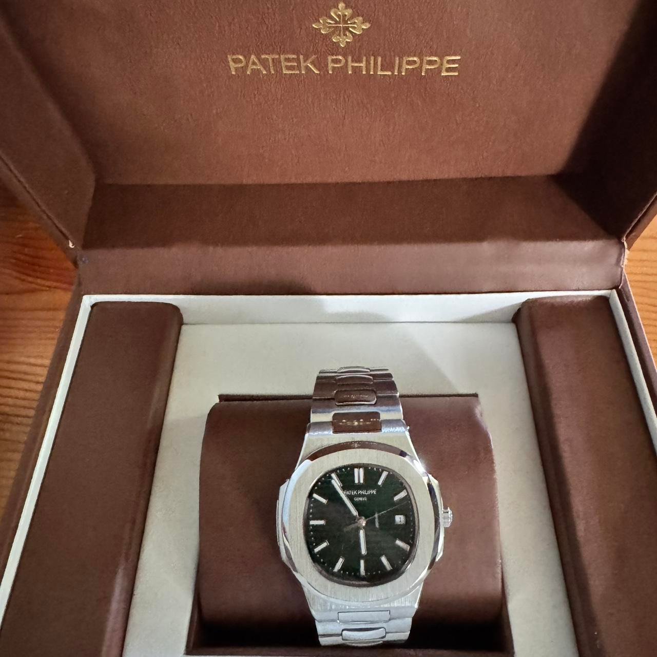P0-1-419.jpg Patek Philippe Men's Silver and Green Watch - Image 1
